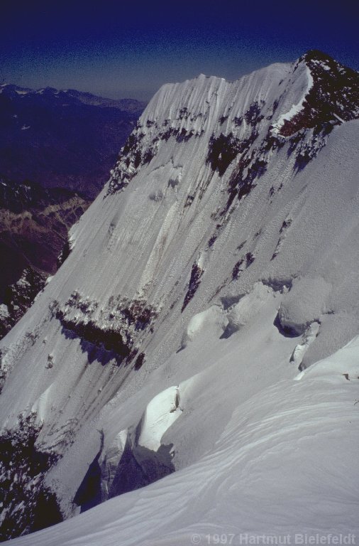 The south wall is so huge, we can take a photo only of parts of it. This is the uppermost part with the south summit...