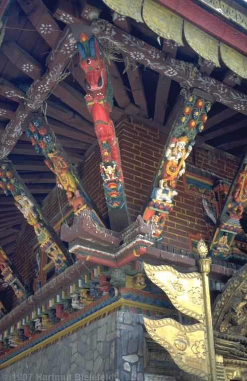 Temples and palaces are decorated with elaborate wood carvings.