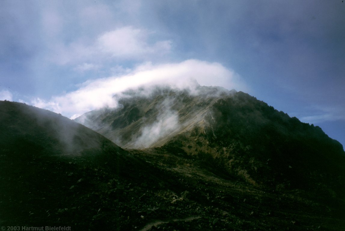 a little bit of Iliniza Norte can be seen in the clouds. It´s a pity that we didn´t quickly go up this evening.