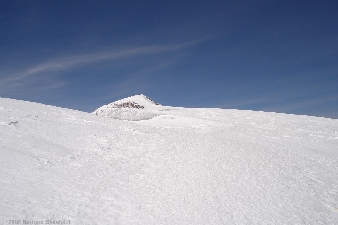... until at the end of the plateau the summit is visible