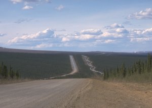 The road follows the pipeline more or less closely.