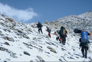 porters on the way to base camp
