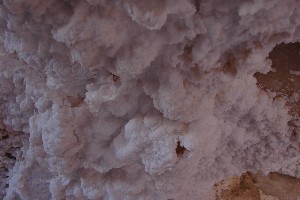 Salt covering the walls of a small cave