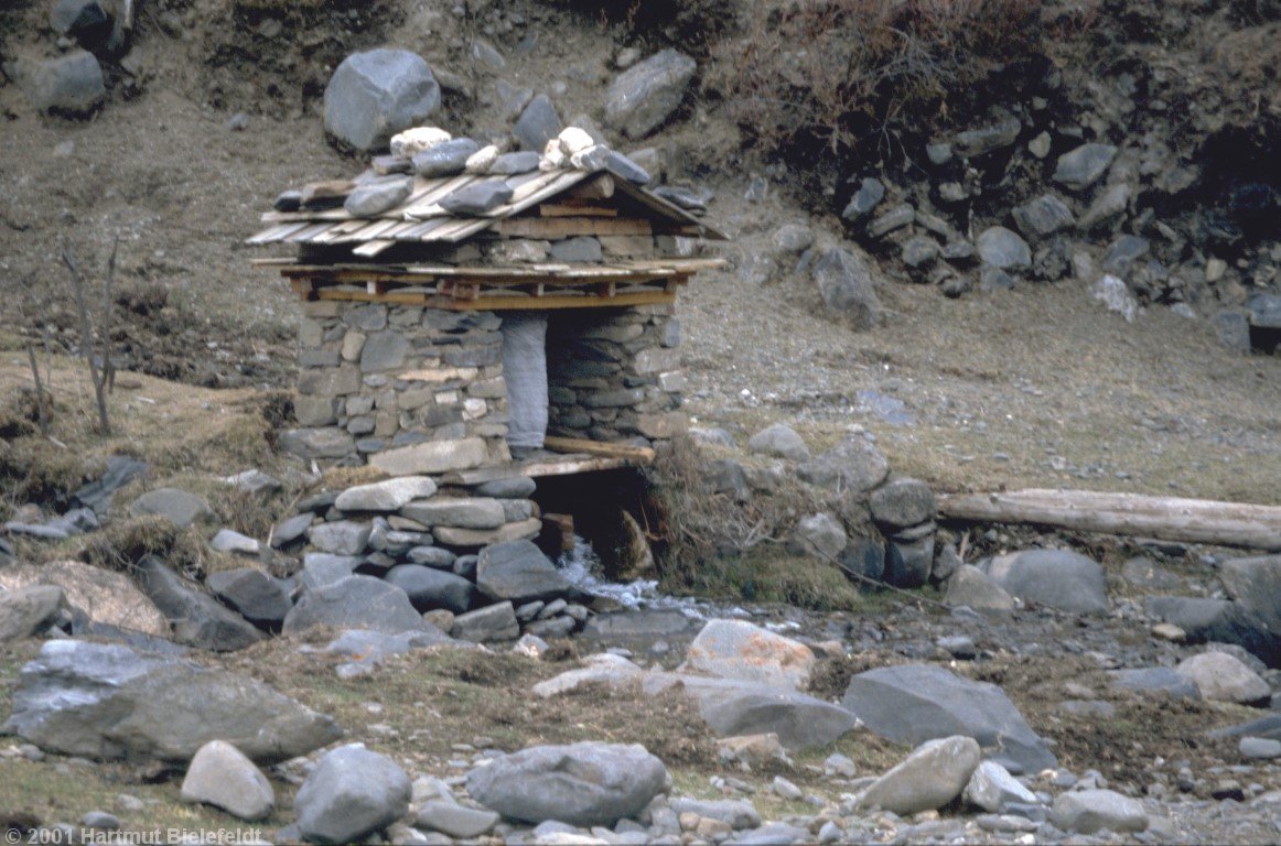 Very practical: a water-driven prayer wheel.