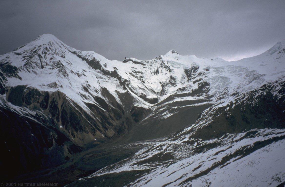 Because anyway the weather is worsening, we go back to basecamp and get more belay material.