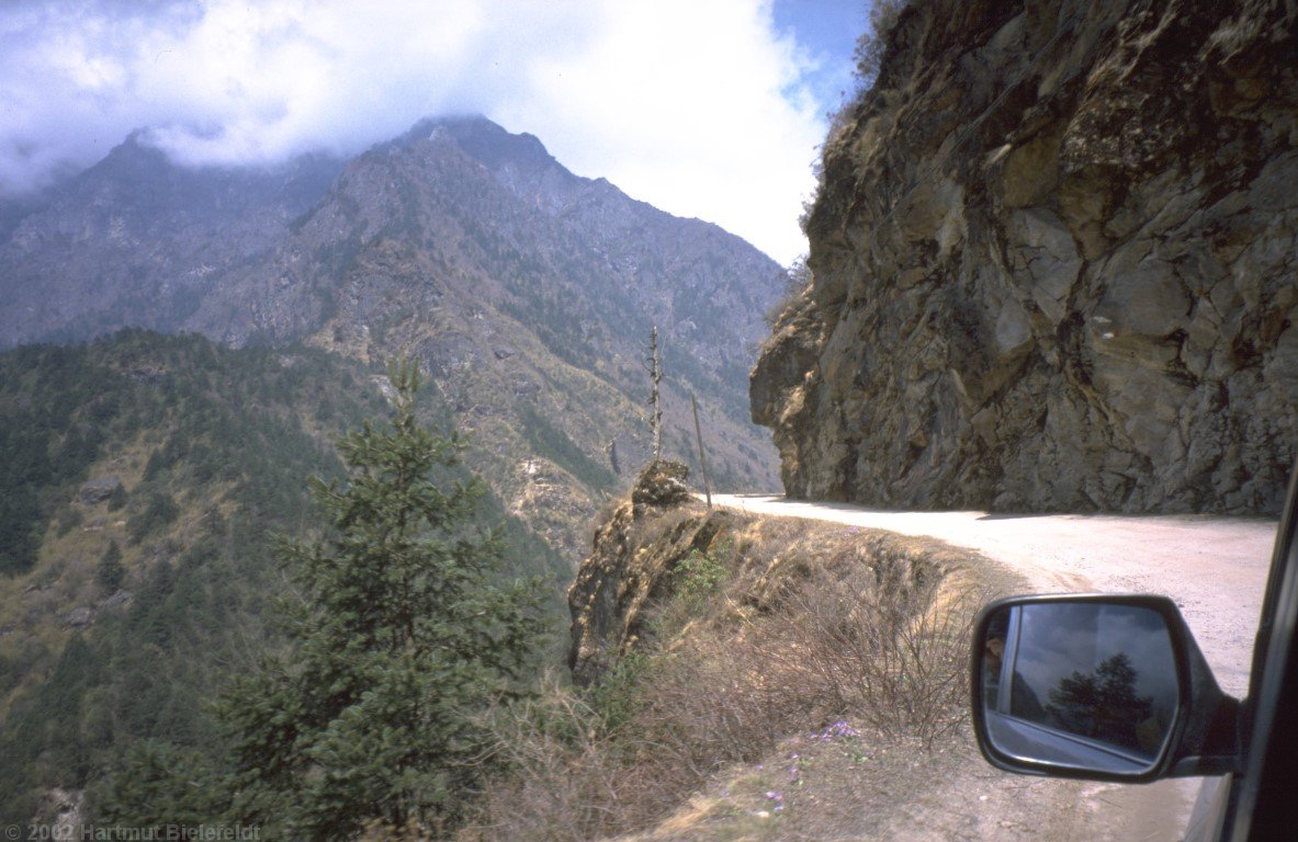 The road to Nyalam is running close to the cliff all the time