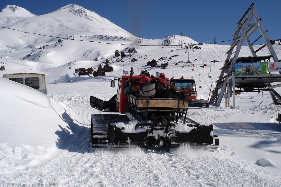 Baggage and cook run ahead by snowcat