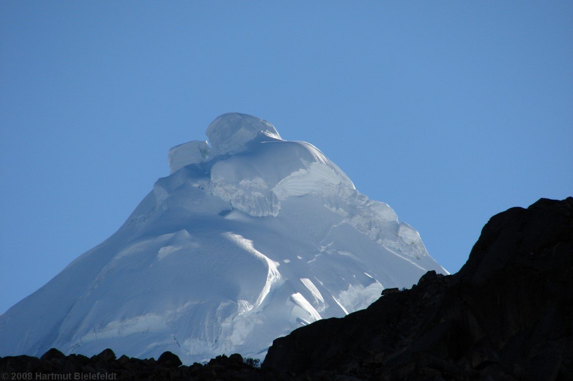 the summit of Tocllaraju looks bold