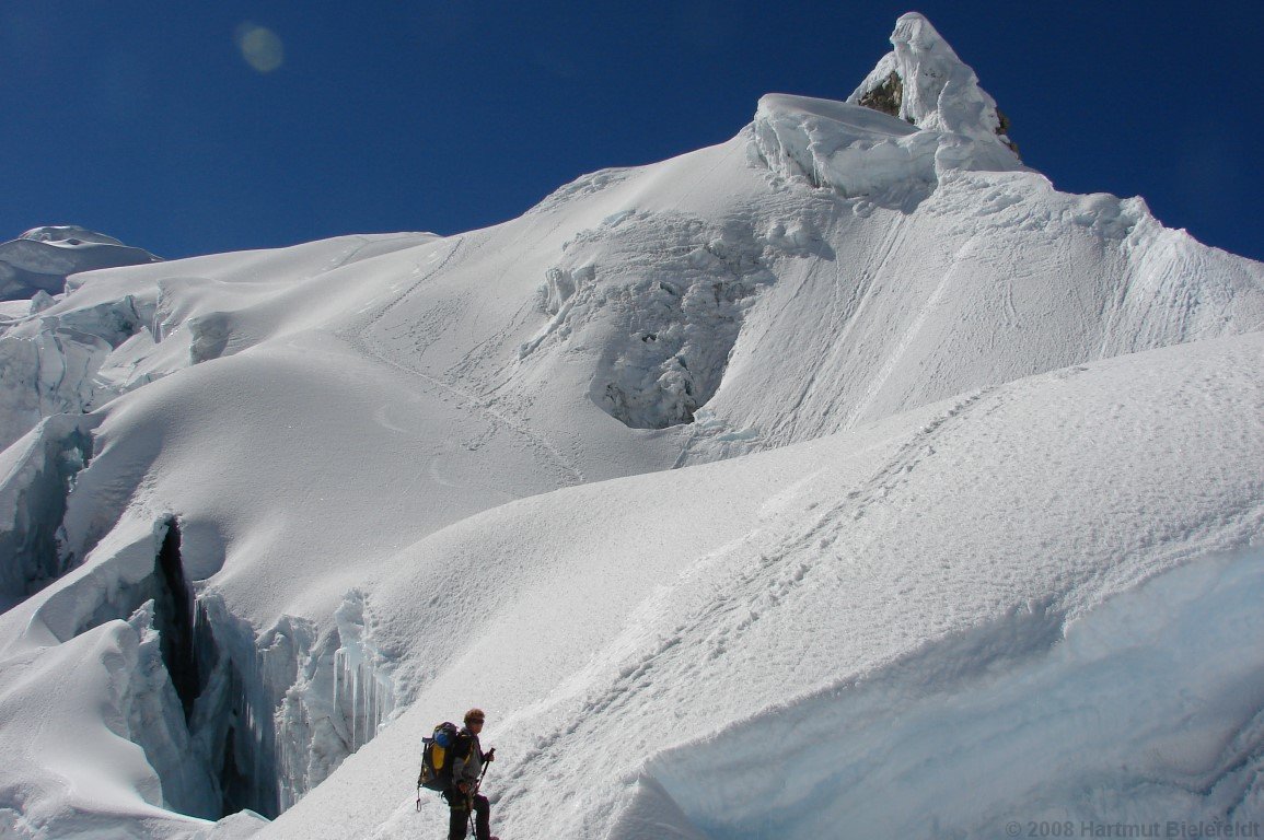 The deep crevasses have a good snow bridge, but only one for each crevasse.