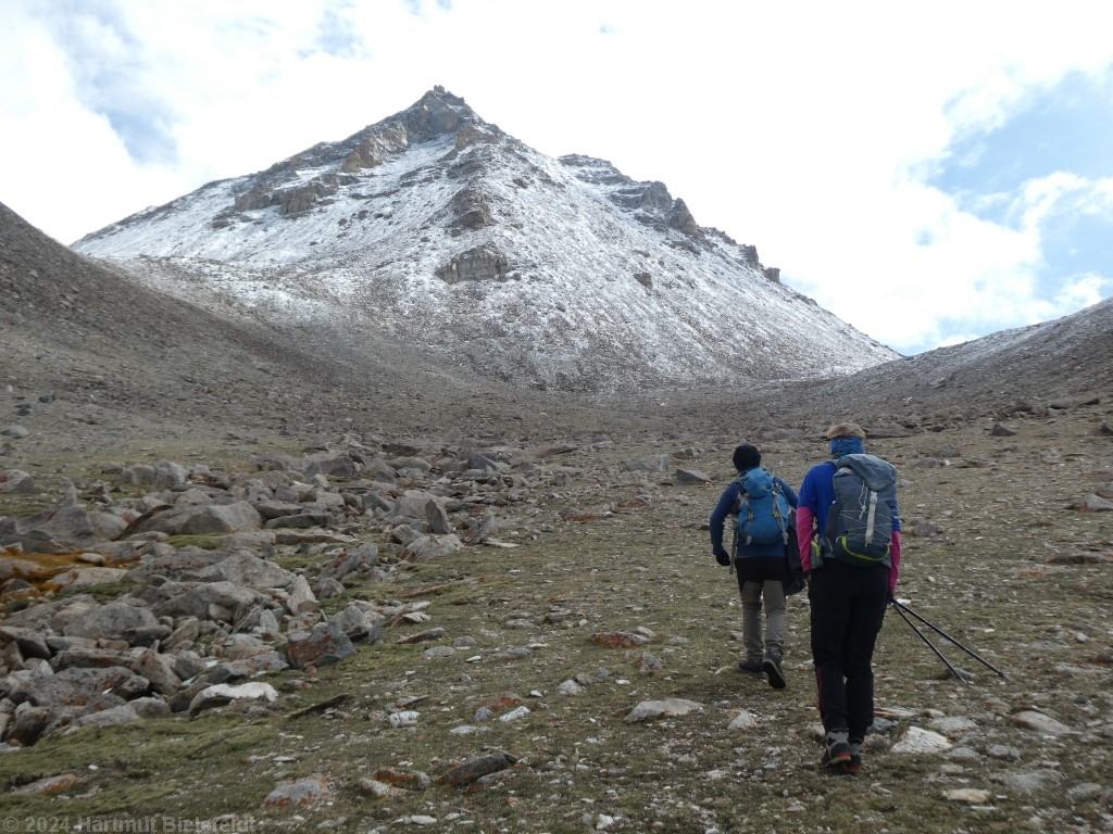 Tough ascent through the scree-covered valley.